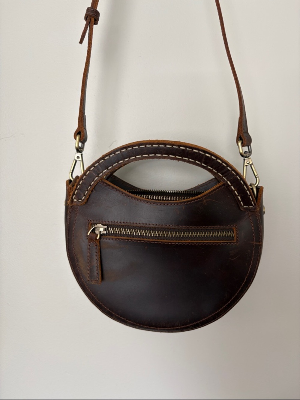 Round Dark Brown Leather Crossbody Bag with Front Zip Pocket